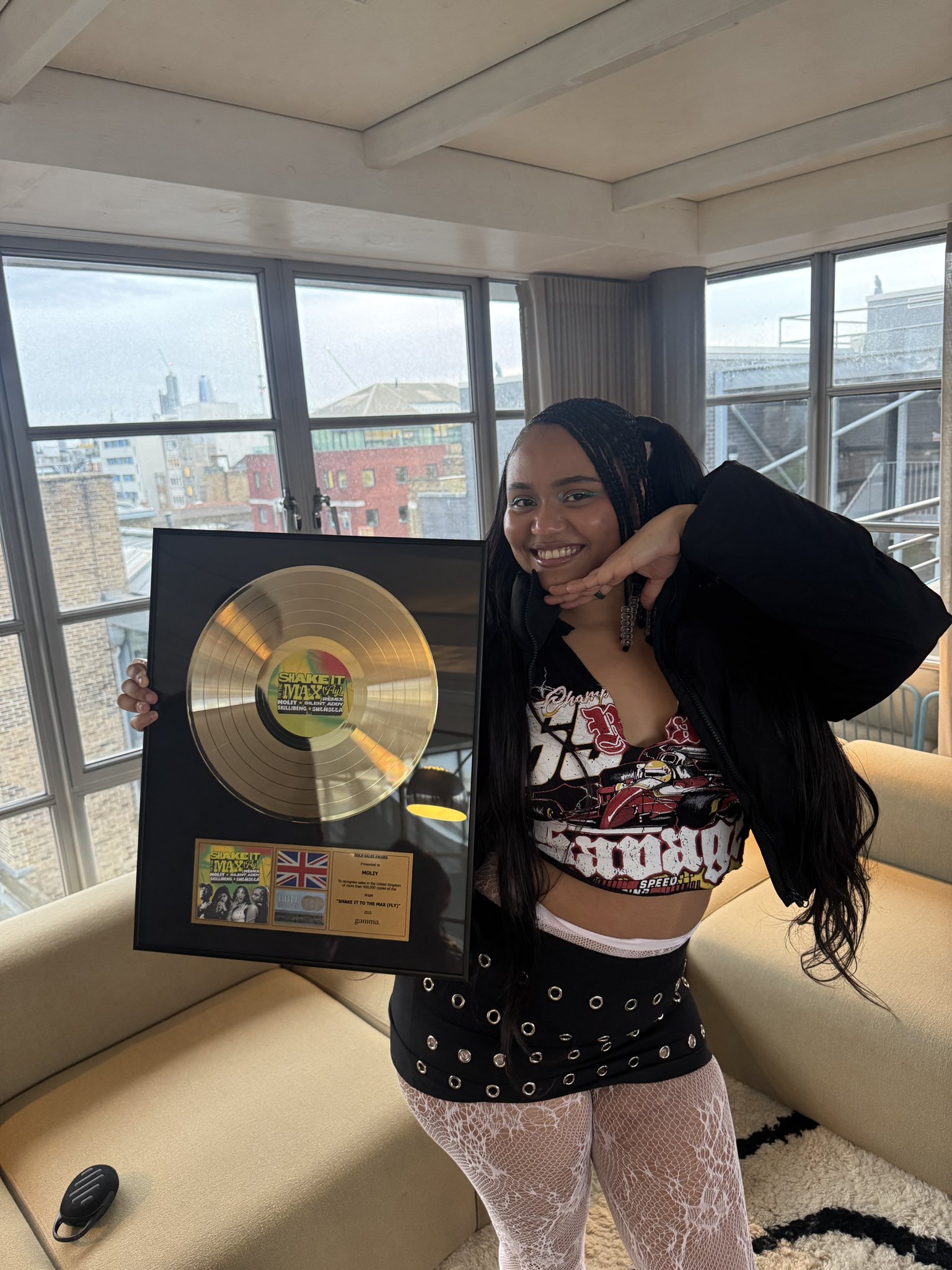 Moliy Celebrates Career Milestone With BRIT CERTIFIED GOLD PLAQUE For SHAKE IT TO THE MAX